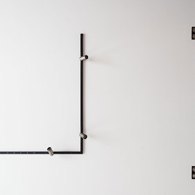 Architectural ceiling lighting with Imagine spotlights in the black Minimal Track rail system for private living spaces