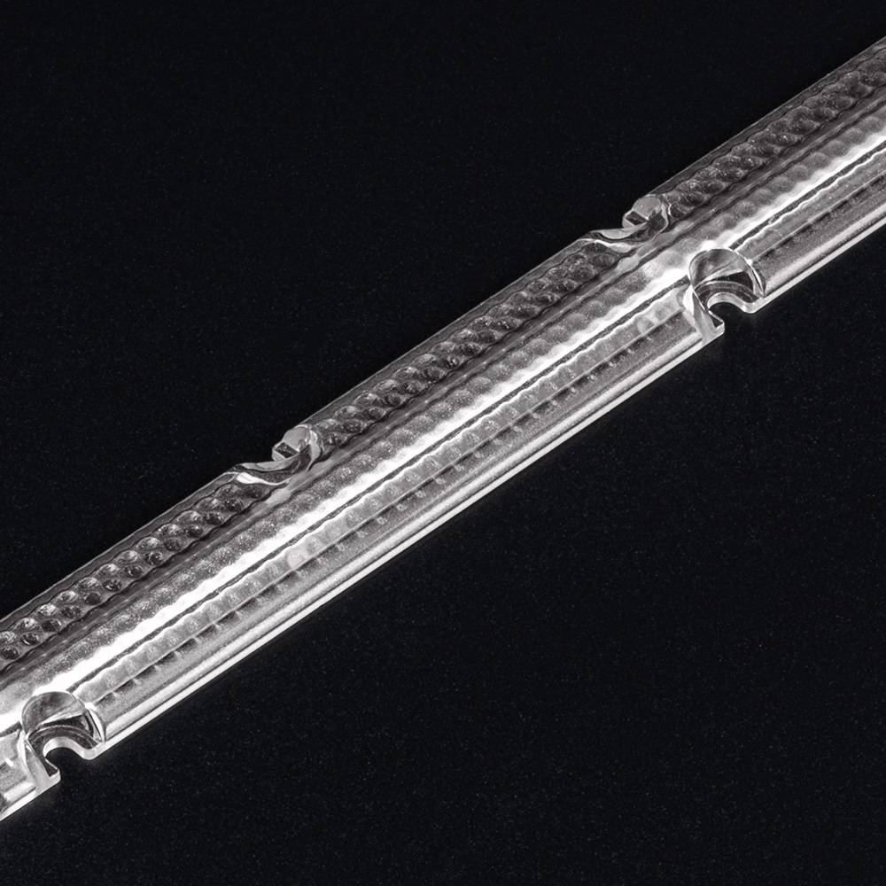 Fase 5 do desenvolvimento da lente Batwing - distribuição de luz optimizada para salas com pouca altura e iluminação homogénea. (Foto da lente)