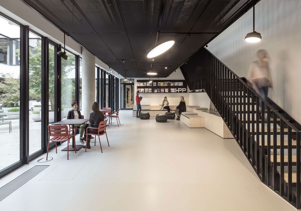 Well-balanced lighting in the break room of a health centre creates a pleasant environment for employees to relax.