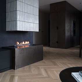 Living area with atmospheric lighting by the fireplace
